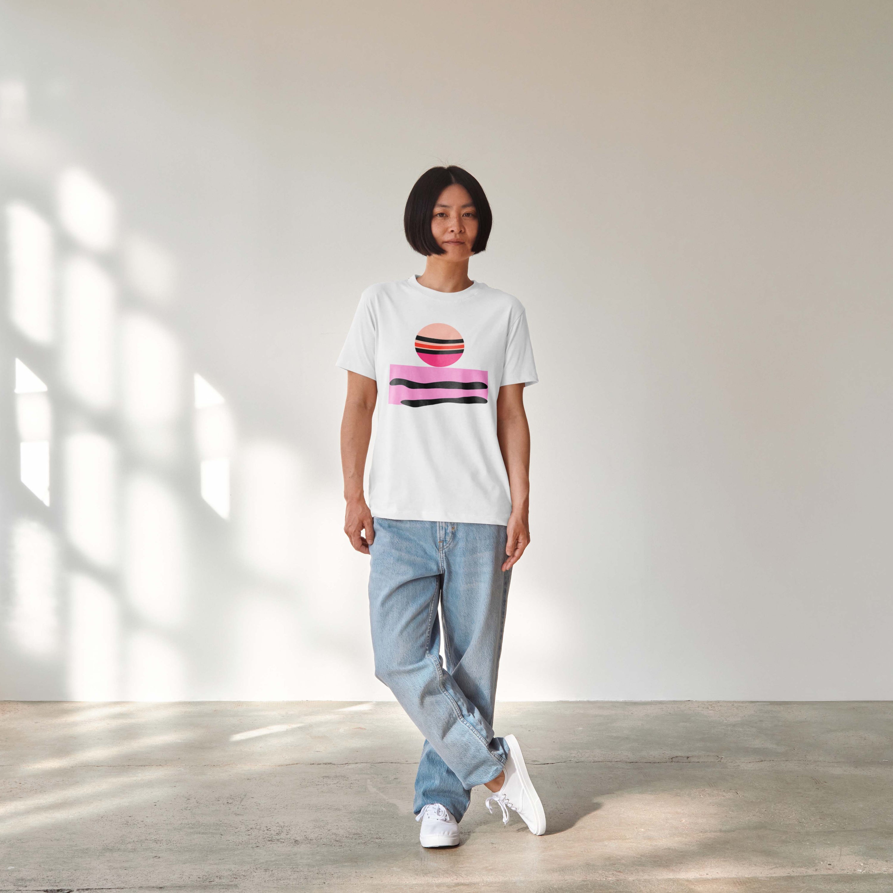 Woman wearing the Abstract Jupiter t-shirt, highlighting the minimalist art design and relaxed streetwear fit