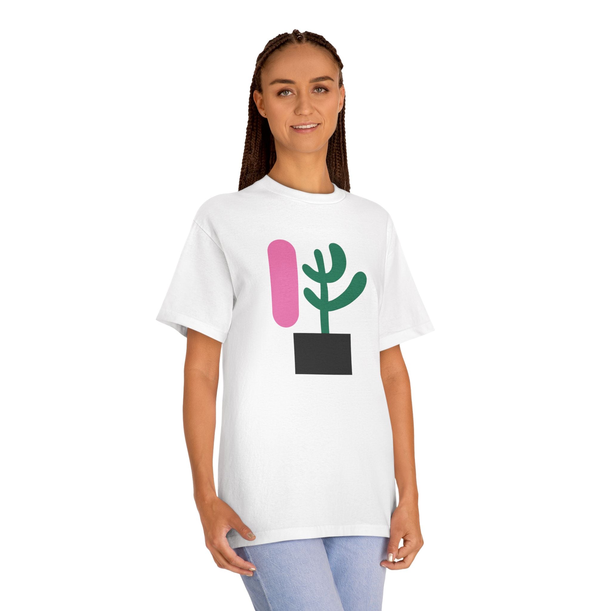 woman wearing a white t-shirt with abstract cactus design