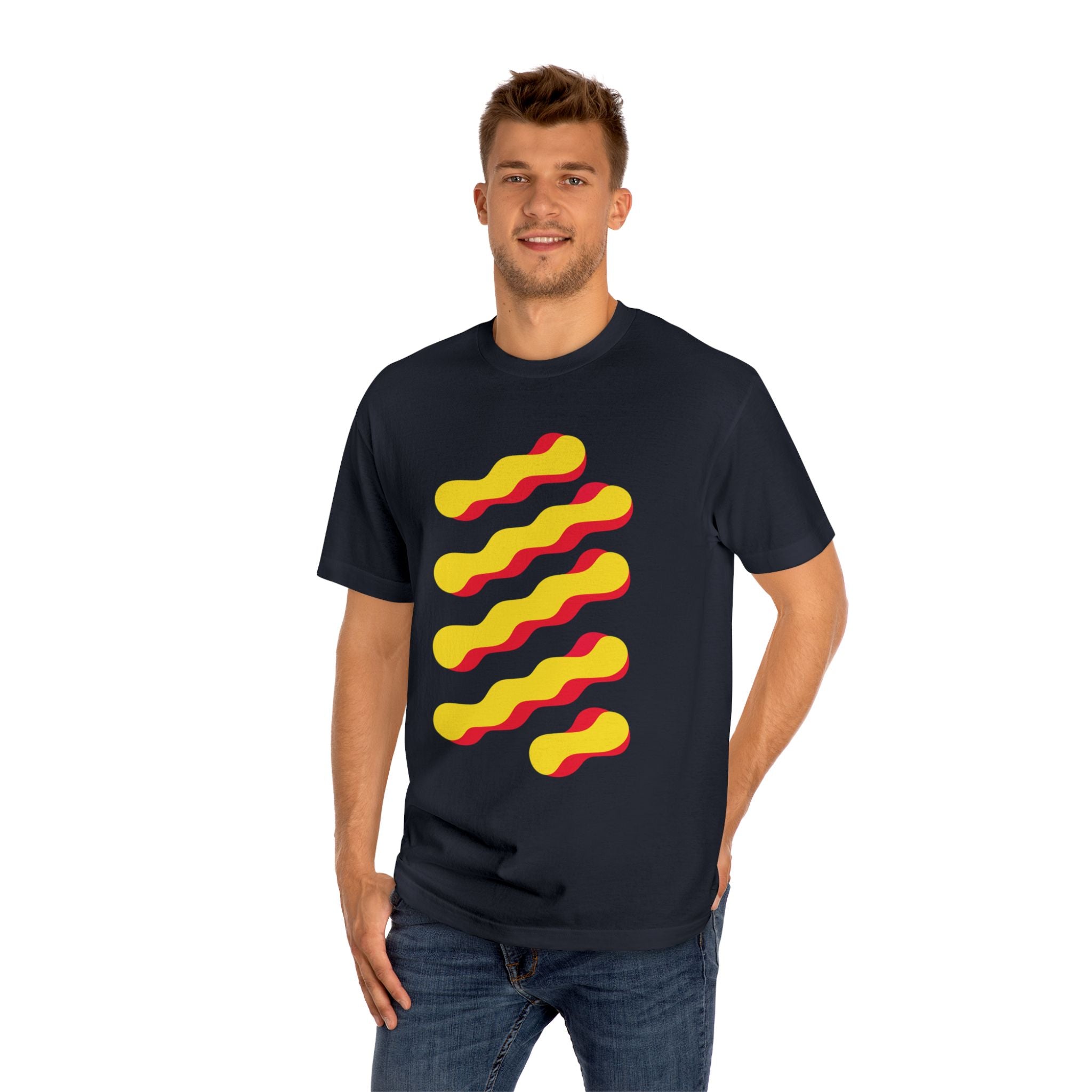 Man wearing the black wavy graphic tee, showcasing the bold yellow and red abstract print and streetwear fit