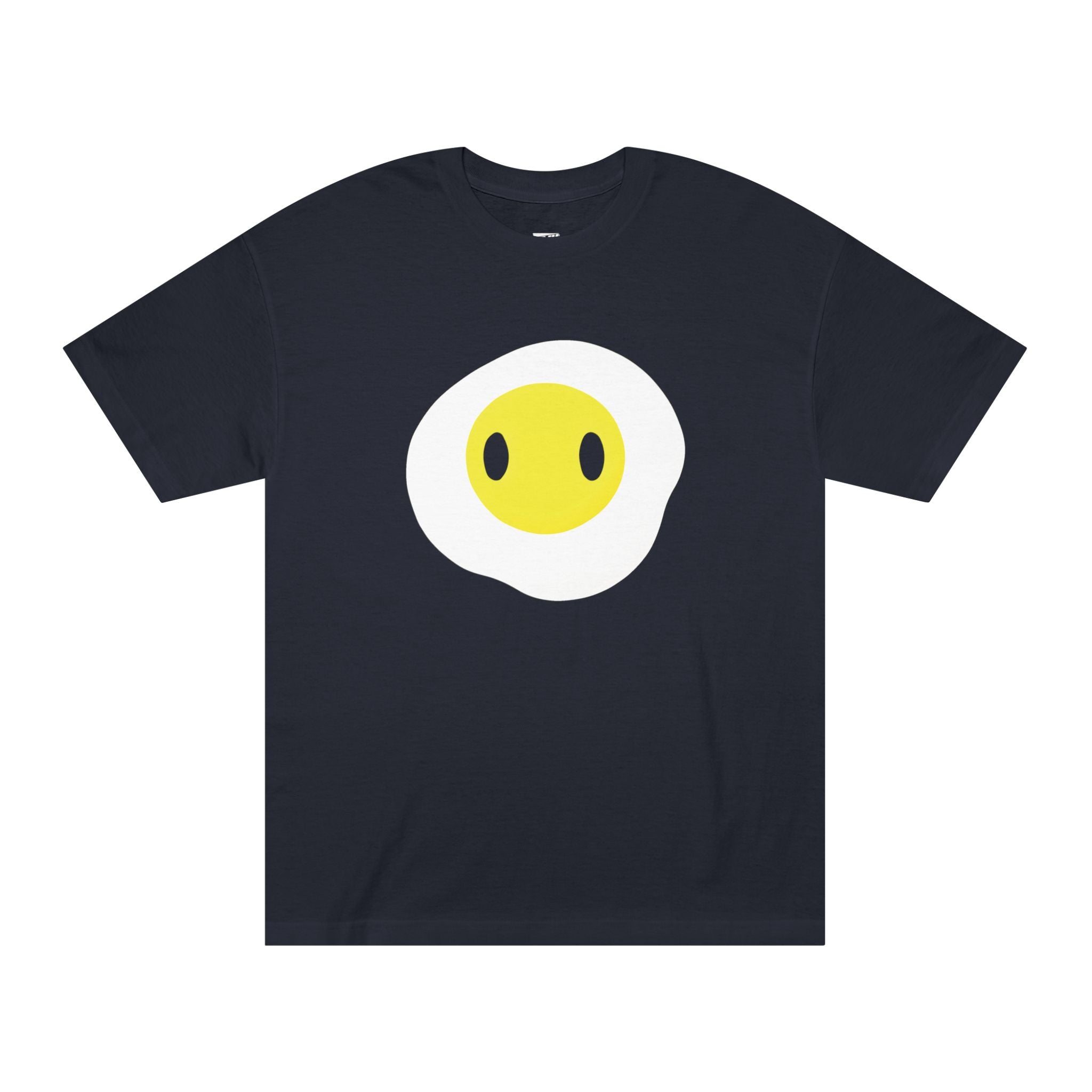 Black t-shirt featuring a minimalist fried egg graphic with a yellow yolk and two cute black eyes