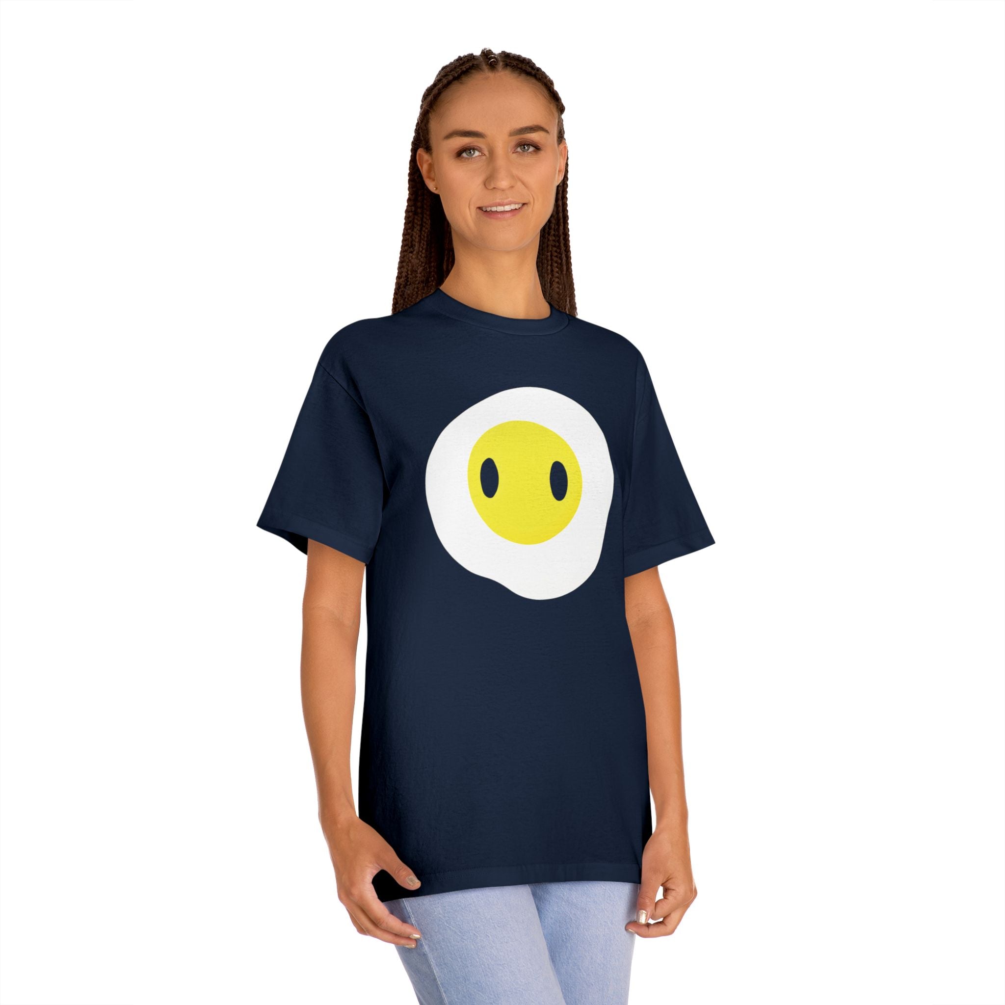 Woman wearing the navy Fried Egg graphic tee, showcasing the cute breakfast character print and casual streetwear fit