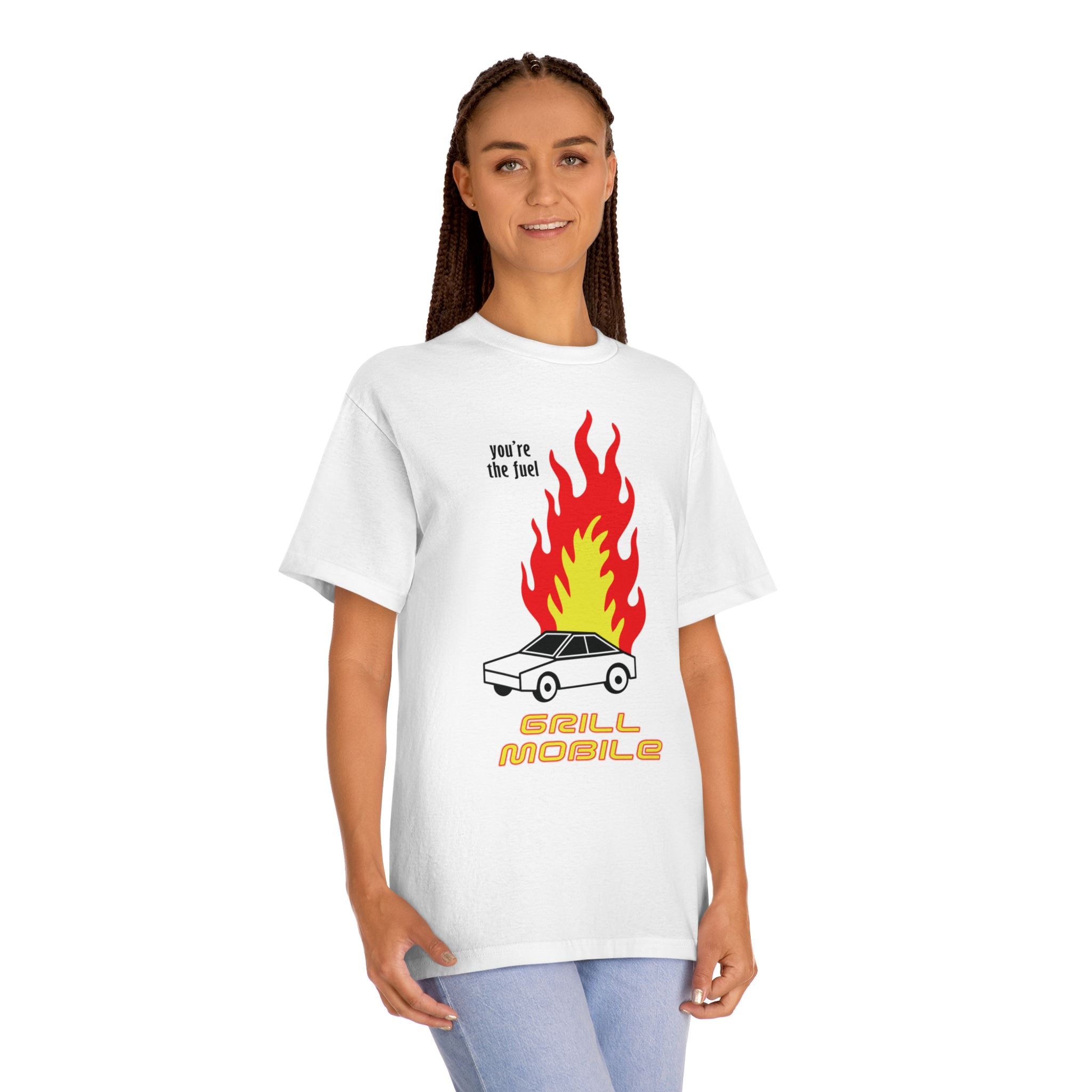 Woman wearing the Grill Mobile graphic tee, styled casually to showcase the edgy burning car print