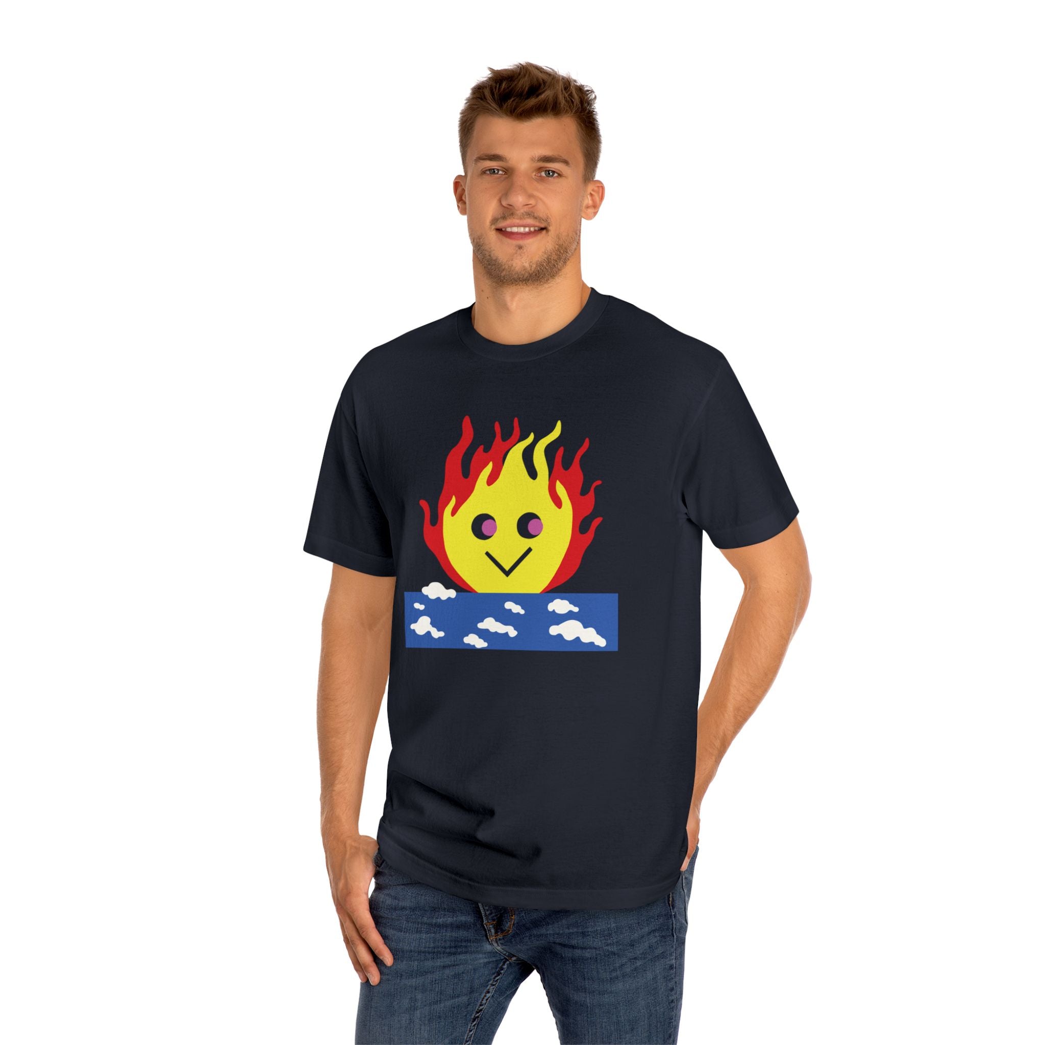 Man wearing a black t-shirt featuring a burning sky graphic with a cute smiling flame character rising from a blue cloud block