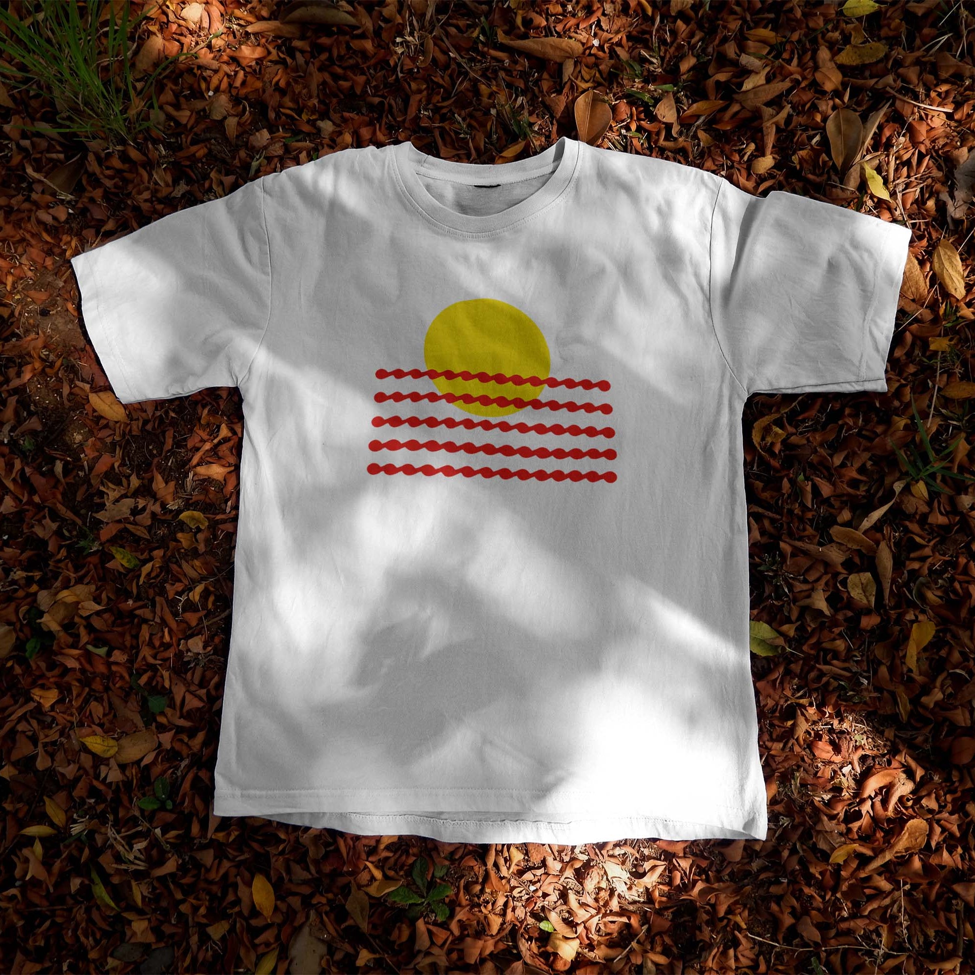 White t-shirt featuring a minimalist graphic of a solid yellow sun circle partially obscured by horizontal red wavy lines