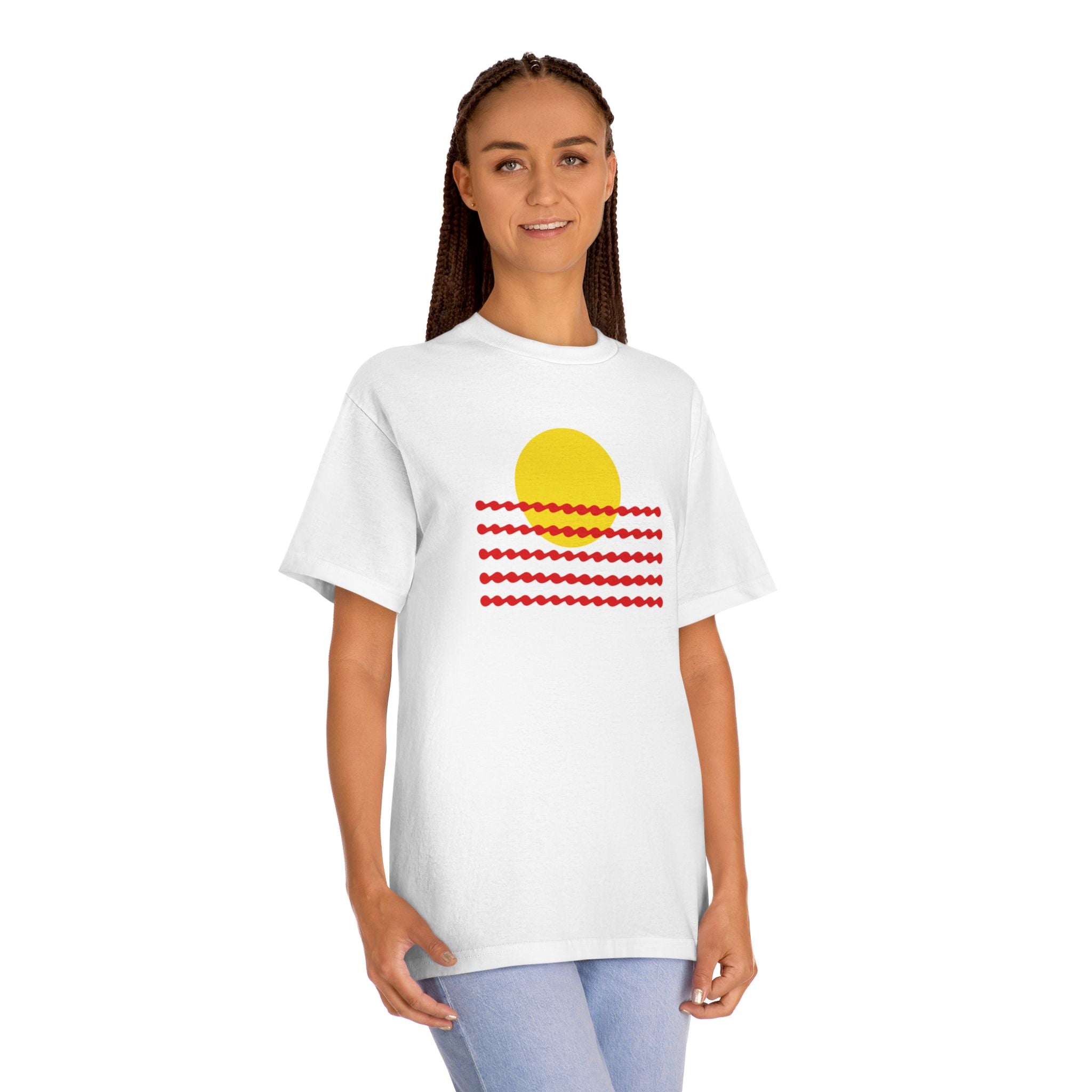 Woman wearing the Sunwaves graphic tee, showcasing the clean geometric sun and wave print on the chest